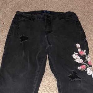 Black skinny jeans with a floral print